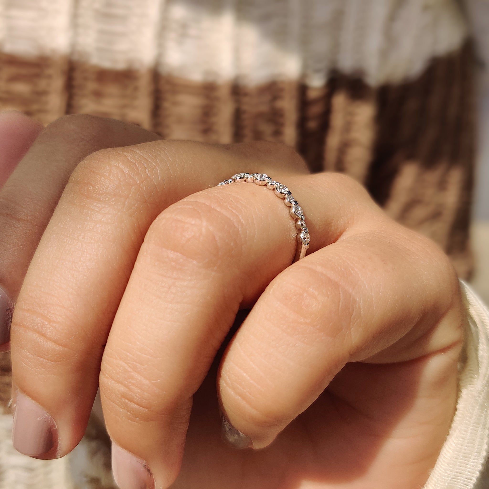 Prong Setting on a half eternity wedding band.
