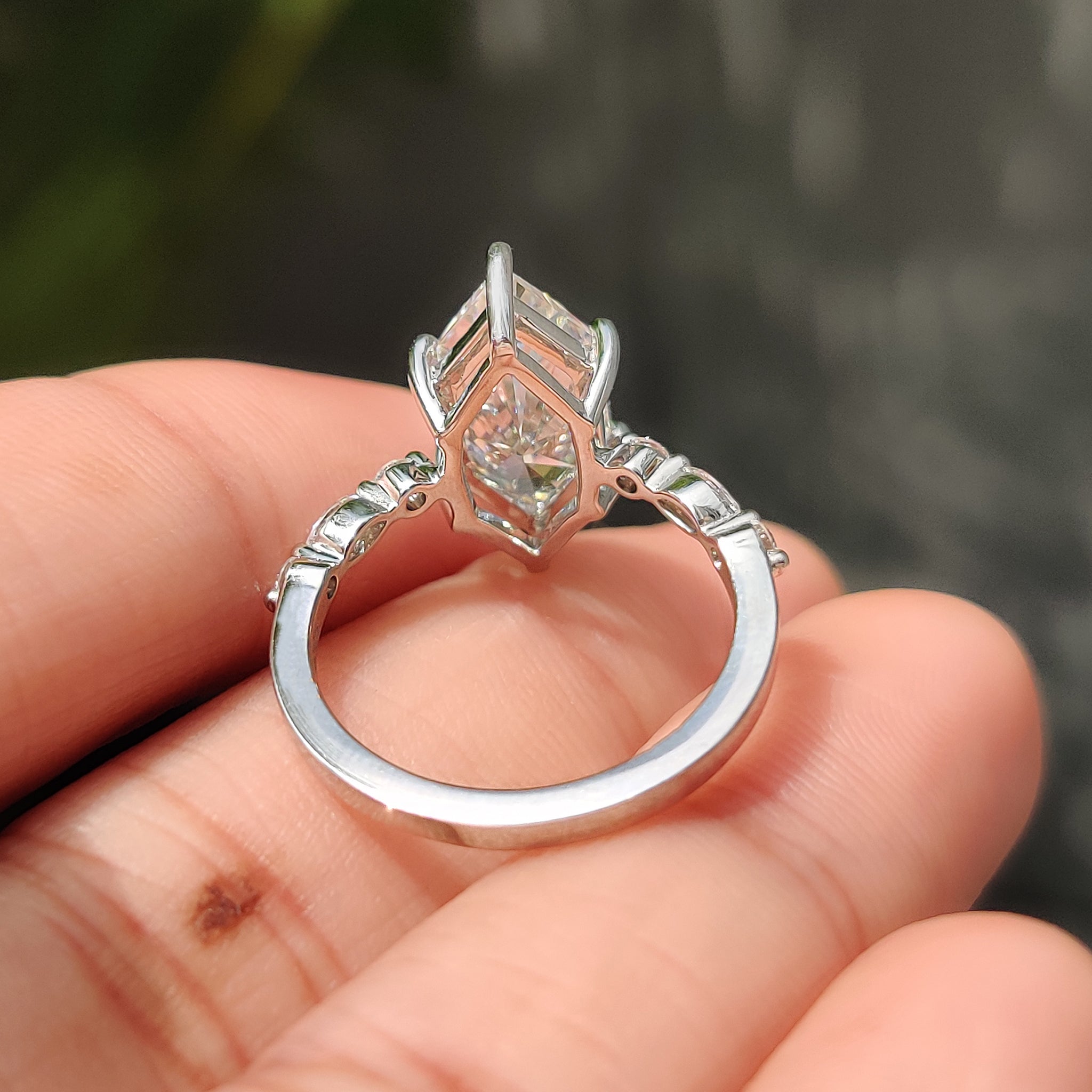 Handmade ring in 7 stone engagement style.
