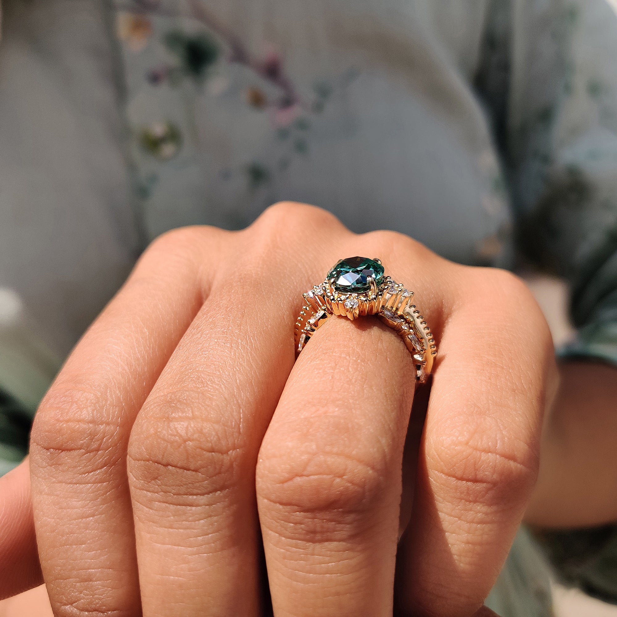 Muse setting ring crafted in yellow gold with a milgrain finish.
