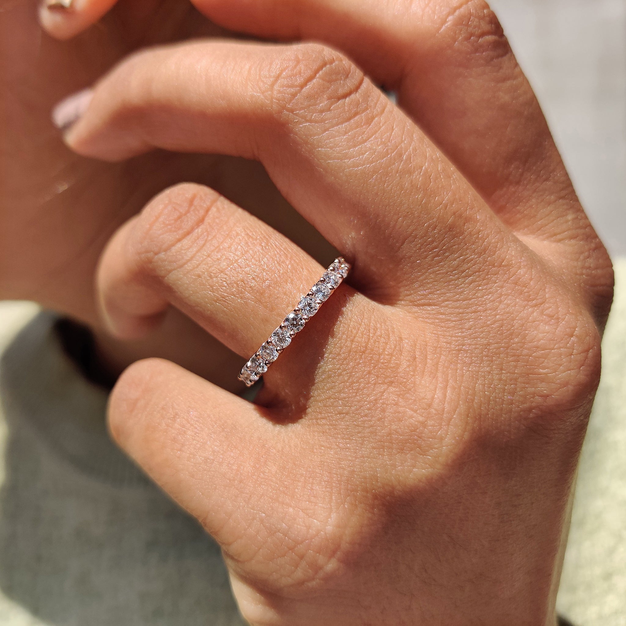 Round eternity band with handmade craftsmanship and diamond setting
