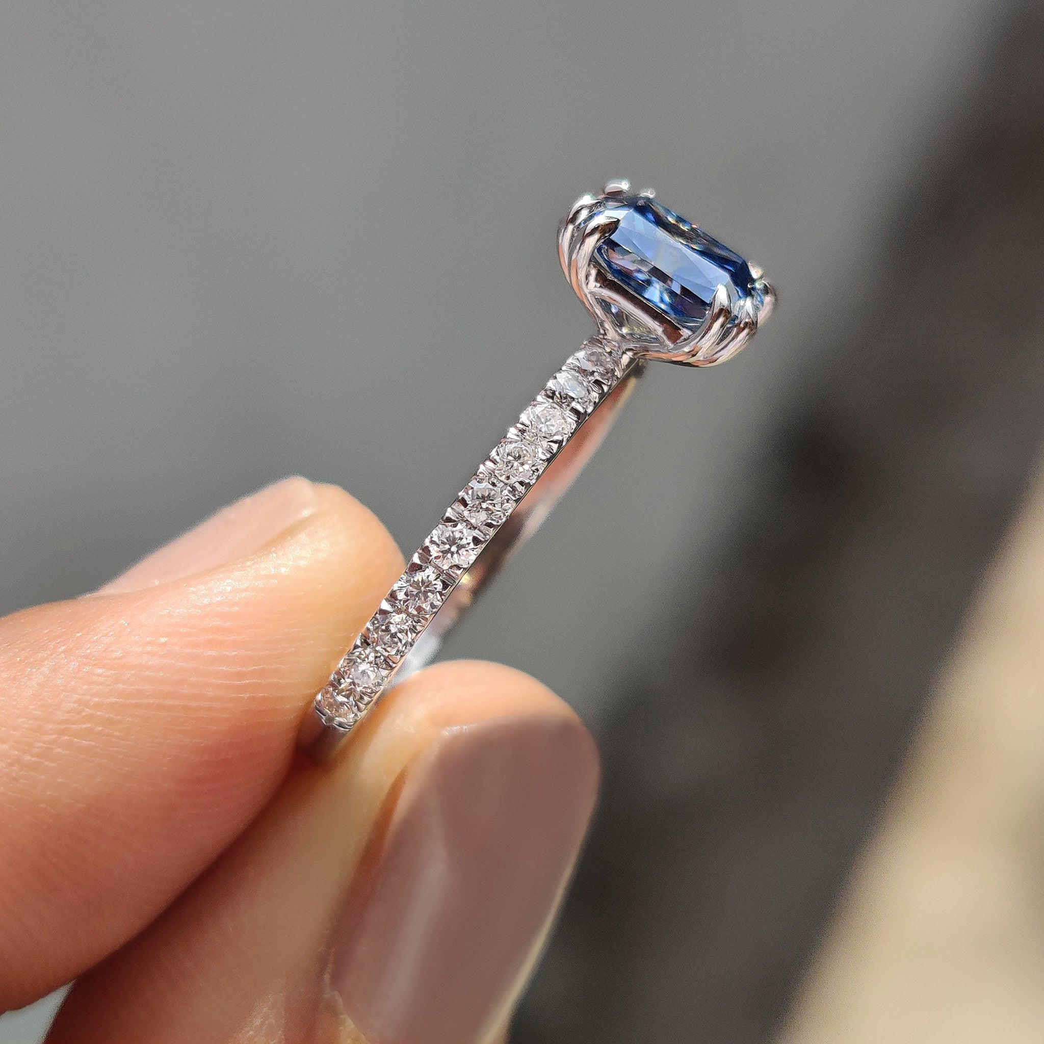 Round cut pave adds detailed brilliance to the ring.
