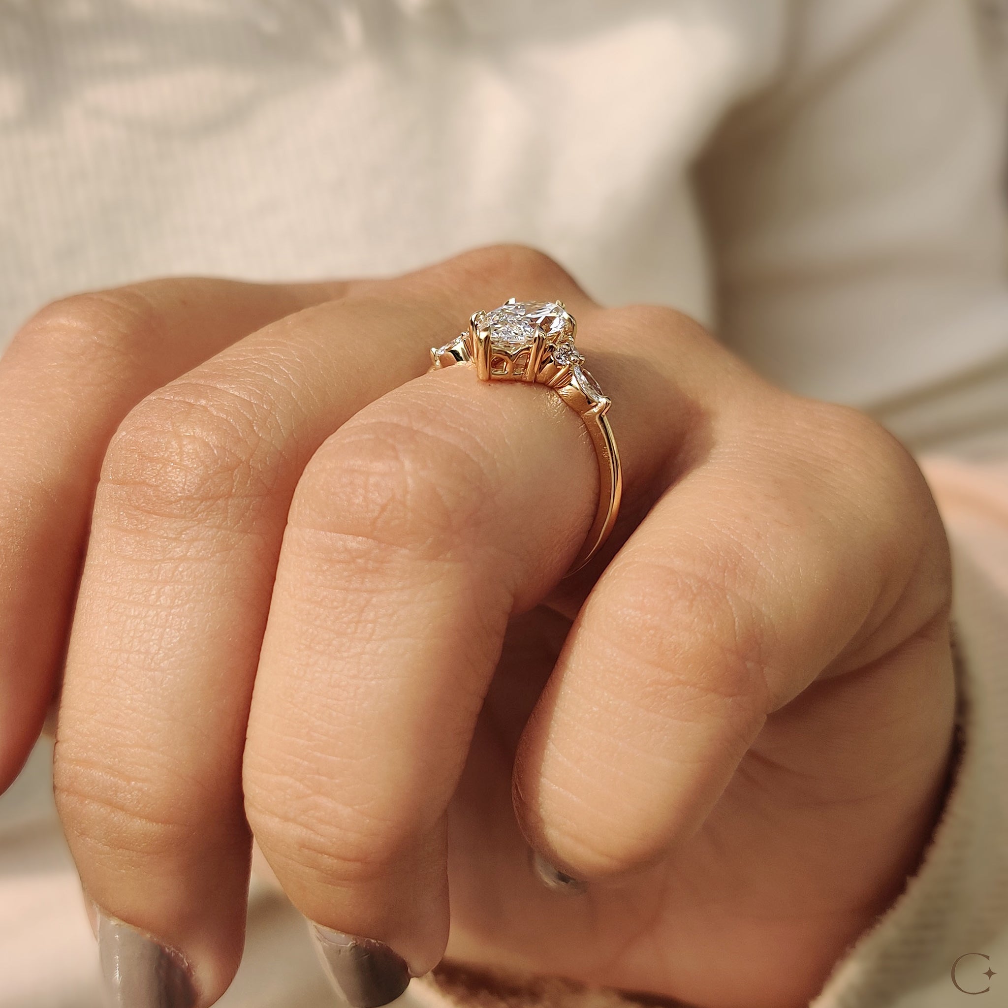 Marquise and round side diamonds in a beautiful ring.
