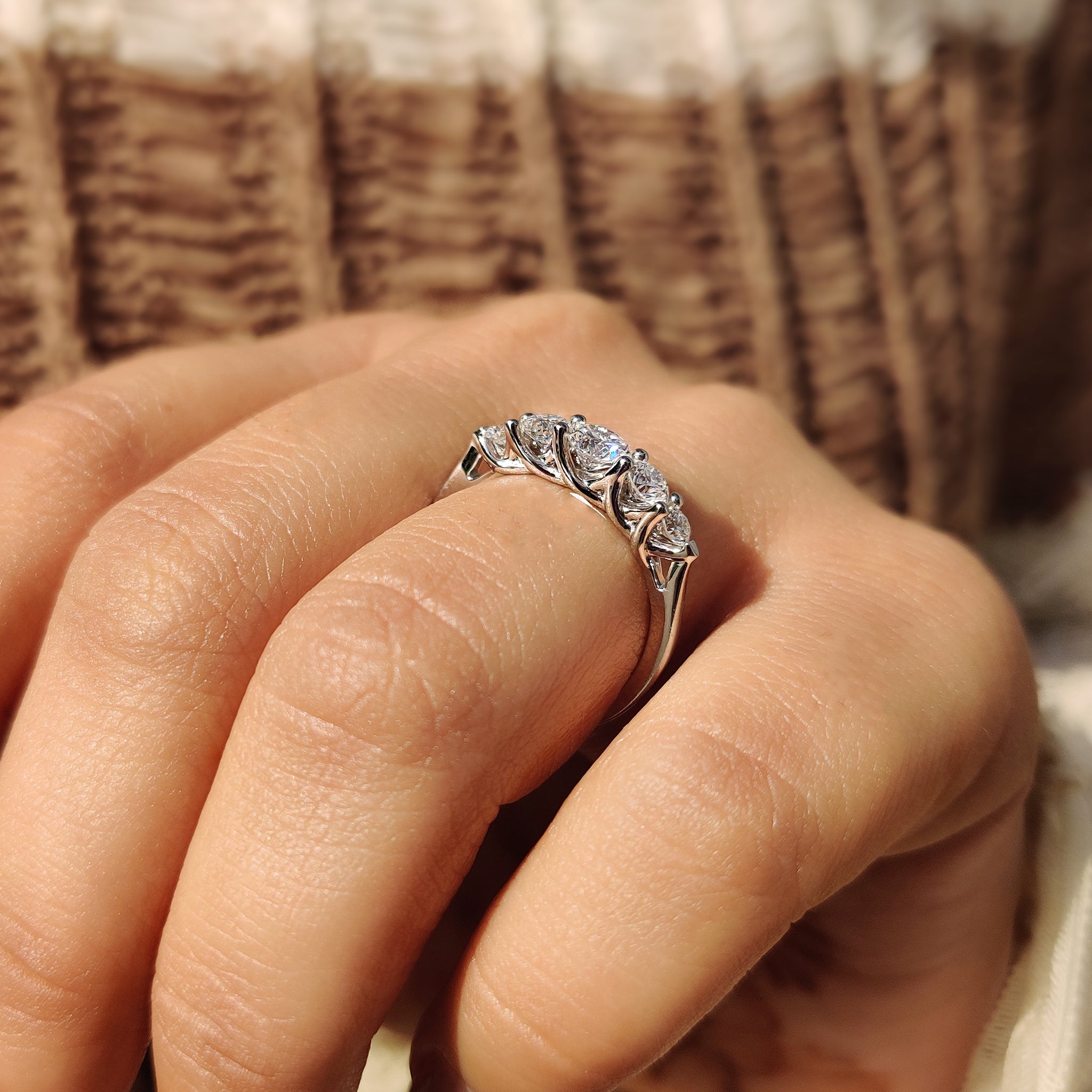 Handmade diamond wedding band with lab grown stones.
