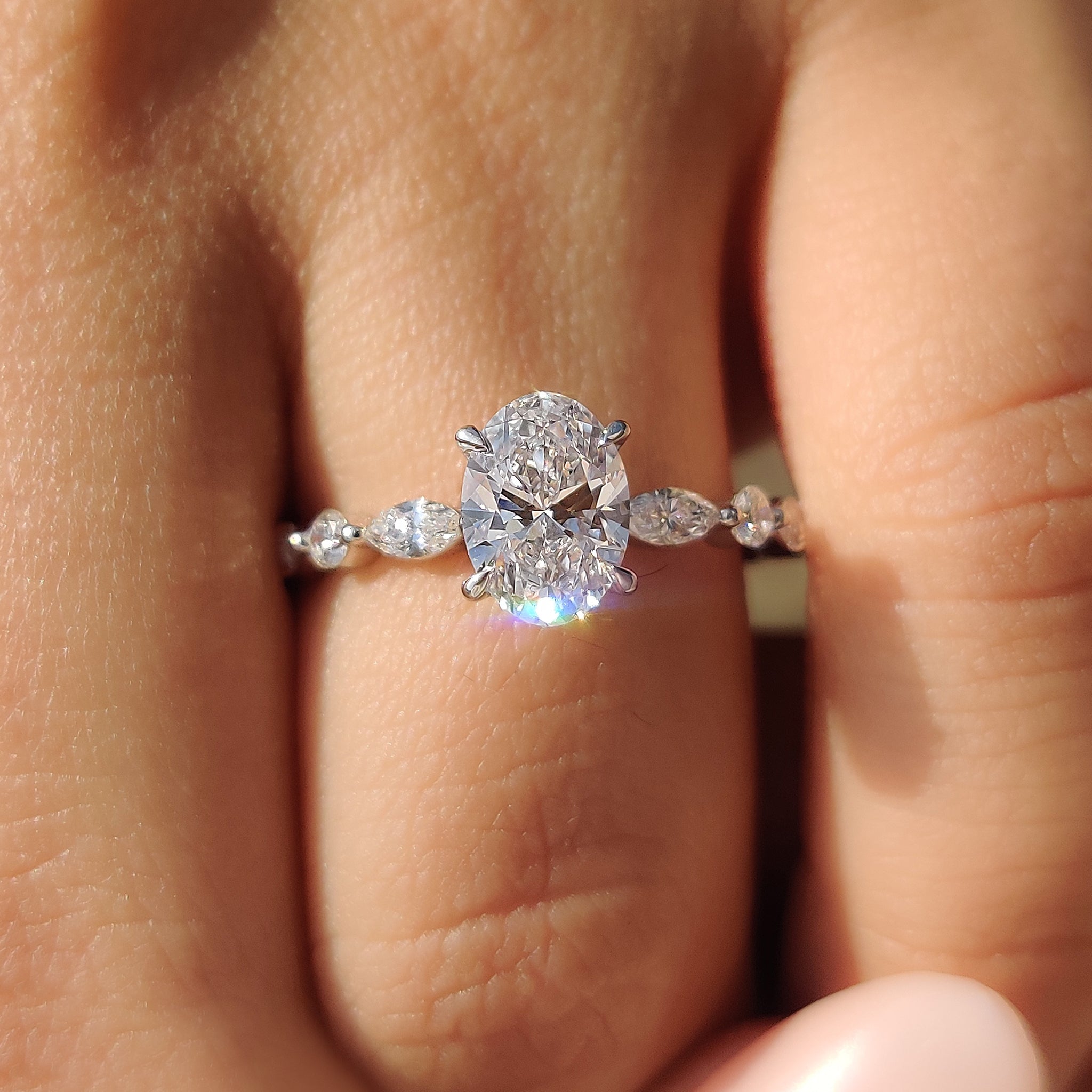 White gold engagement ring with brilliant diamonds.