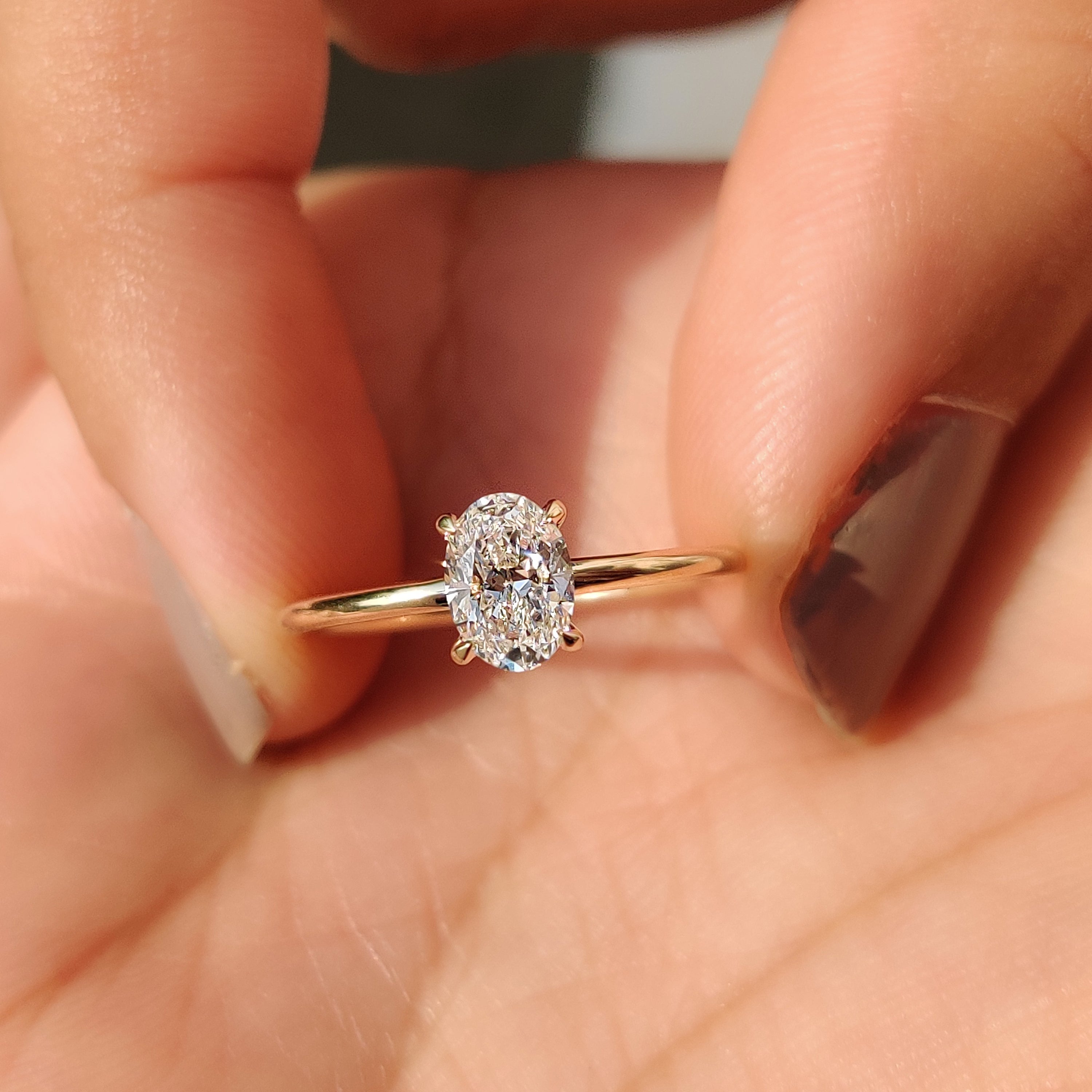 Oval Solitaire Engagement Ring with a Classic Style