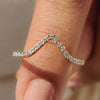 Gold v shaped wedding band combining classic elegance and contemporary design.
