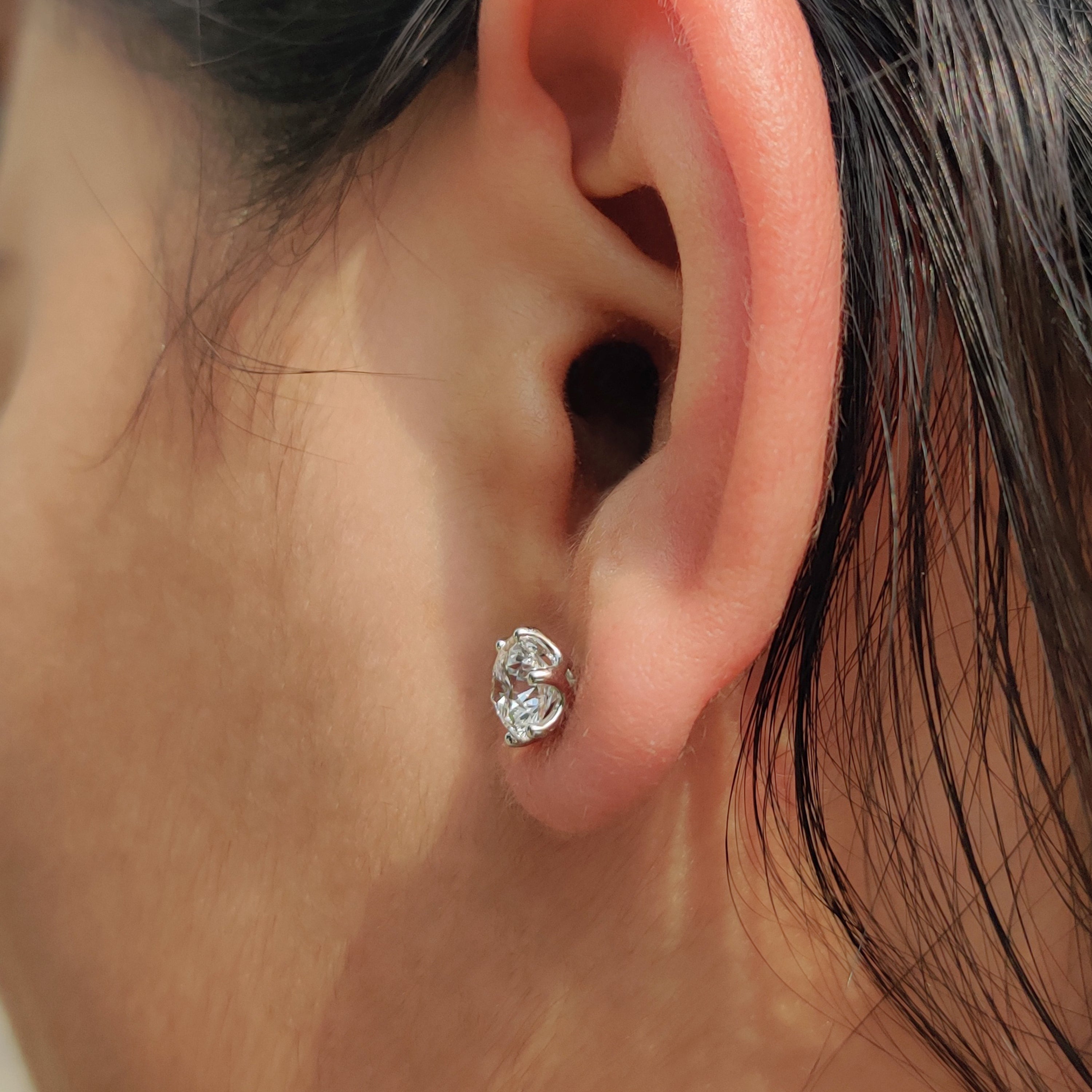Carat diamonds earrings that shine brilliantly.