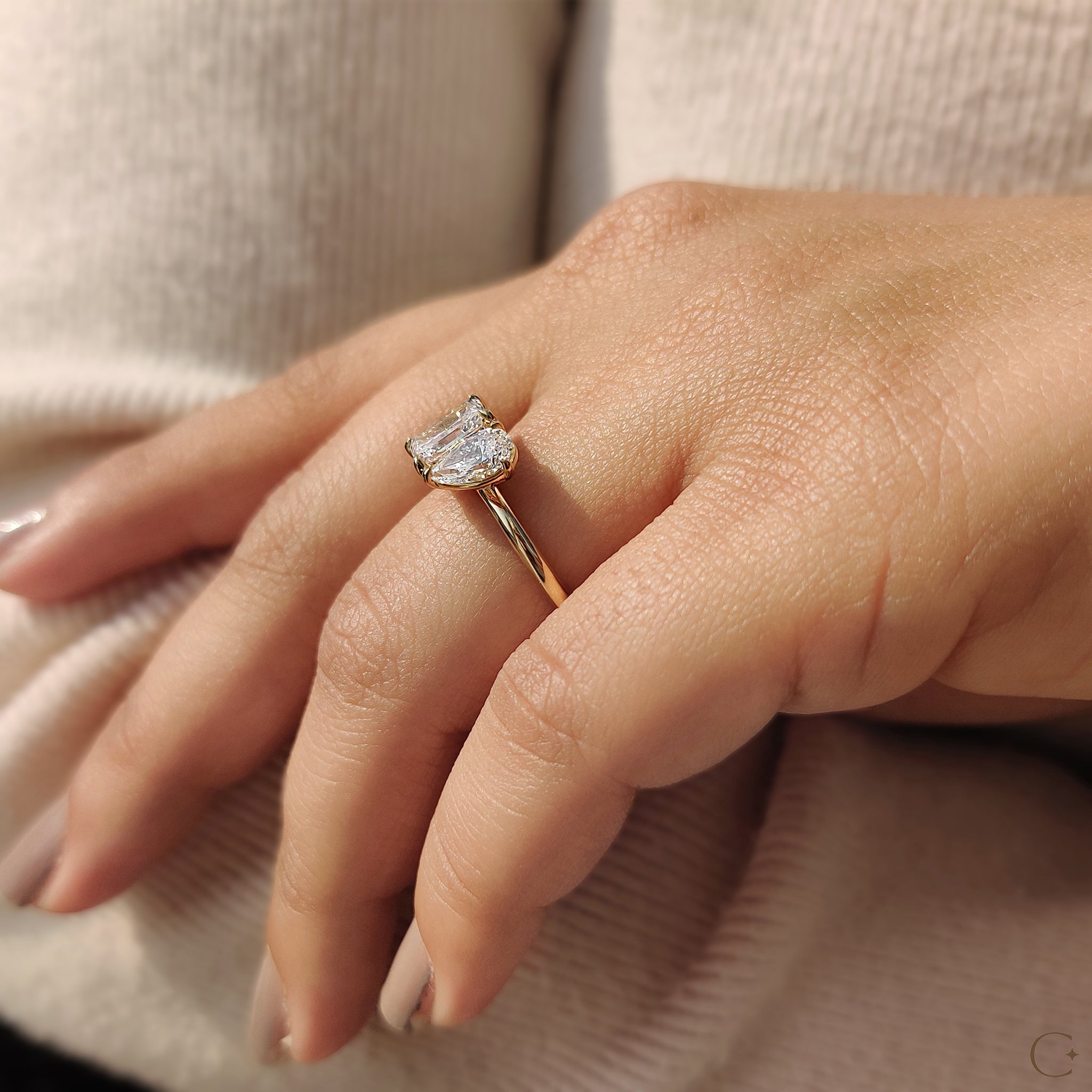 Pear and radiant cut diamond engagement ring.
