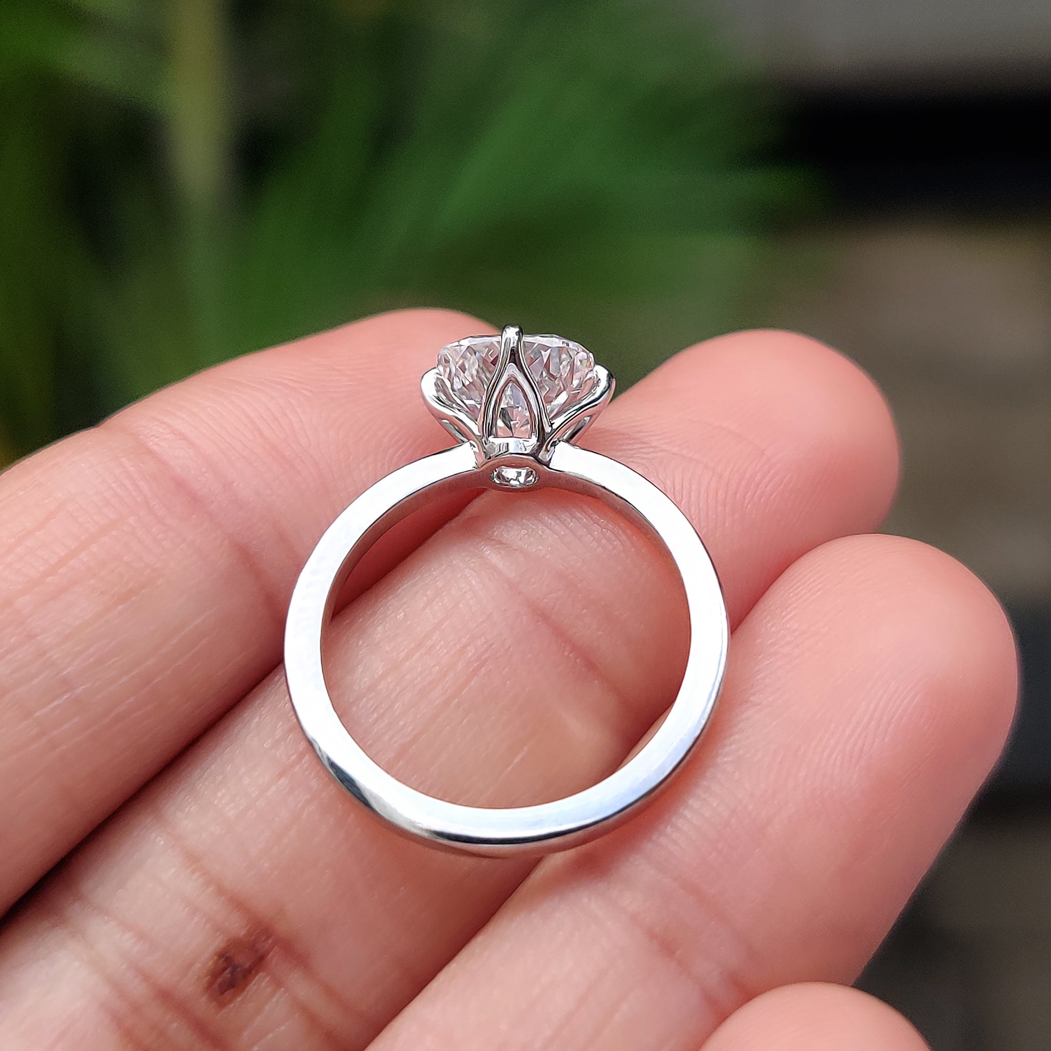 Buy engagement ring in compass prong design.
