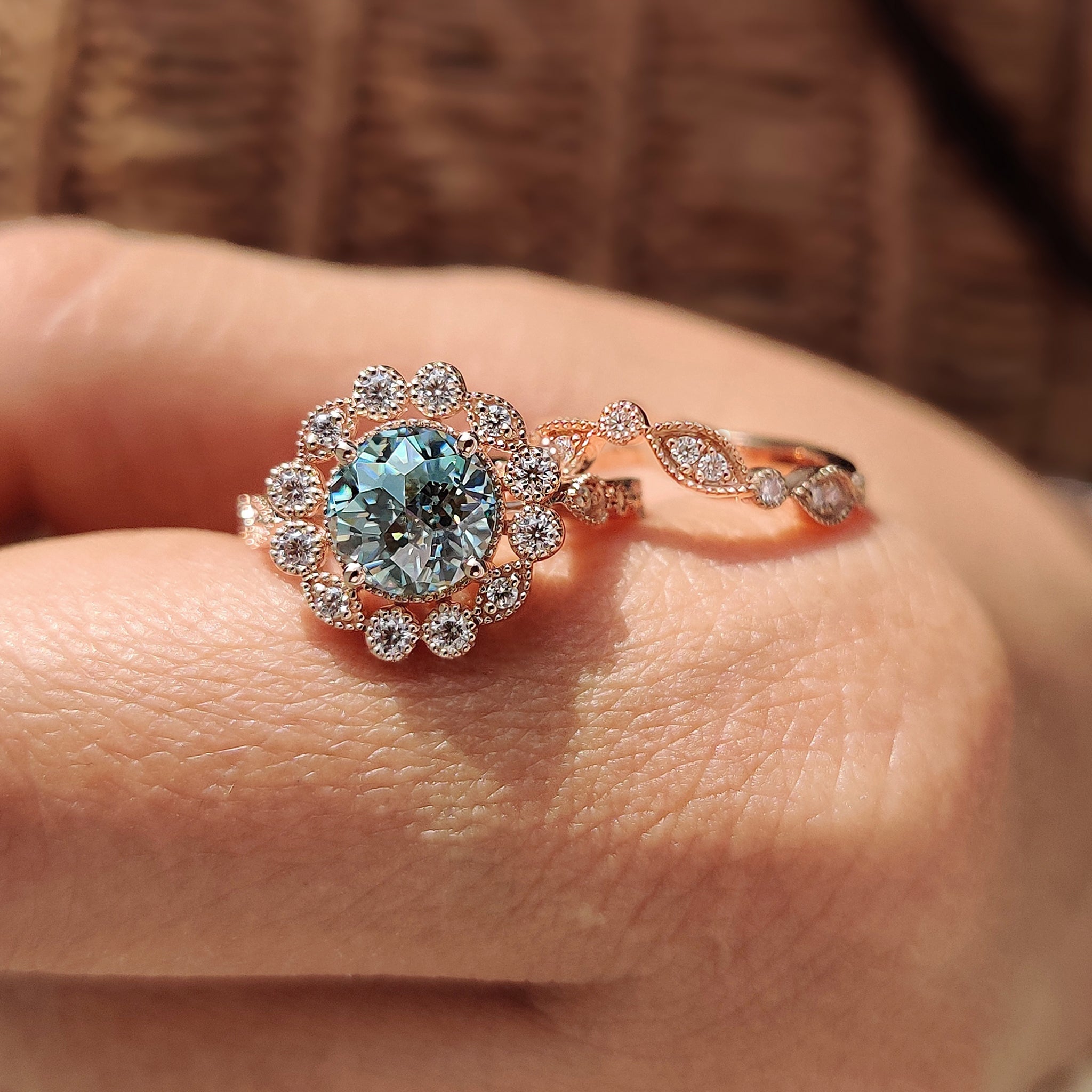 Moissanite bridal set with a marquise shaped outline band and stackable design.

