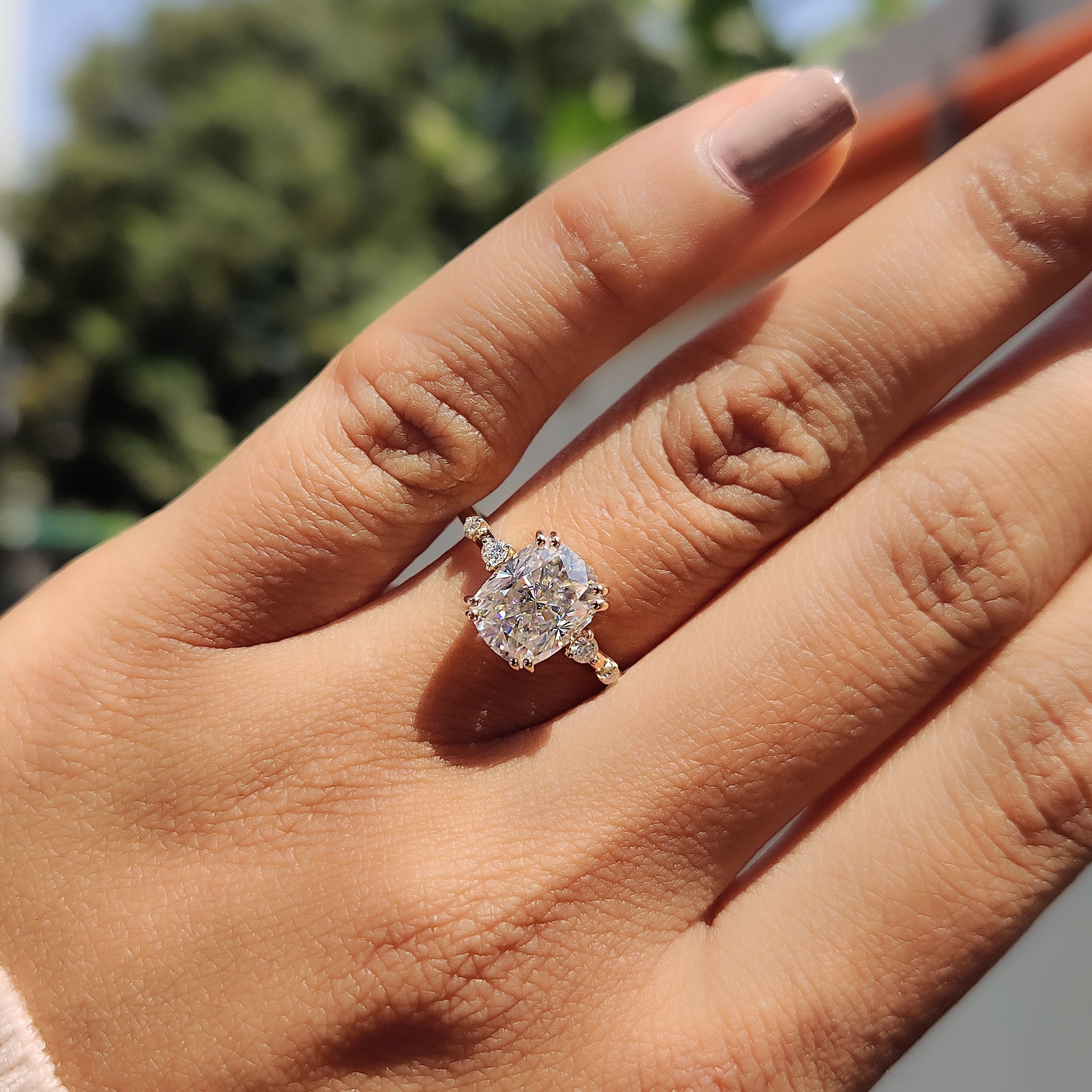 Yellow gold engagement ring in handmade design.