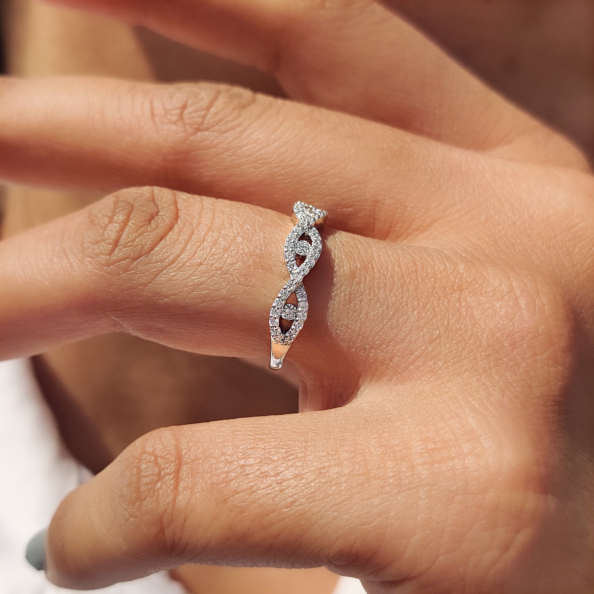 Stackable Diamond Band for a versatile, layered style.
