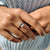 Antique emerald cut ring with yellow gold band.
