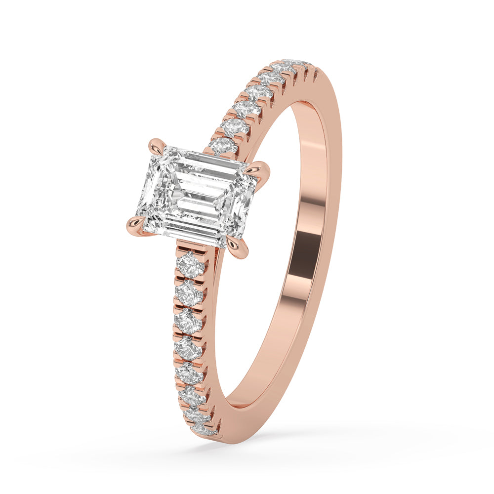 Exquisite emerald diamond ring with a pave band ring, showcasing a 2 Carat Emerald Cut Diamond in a stunning design.
