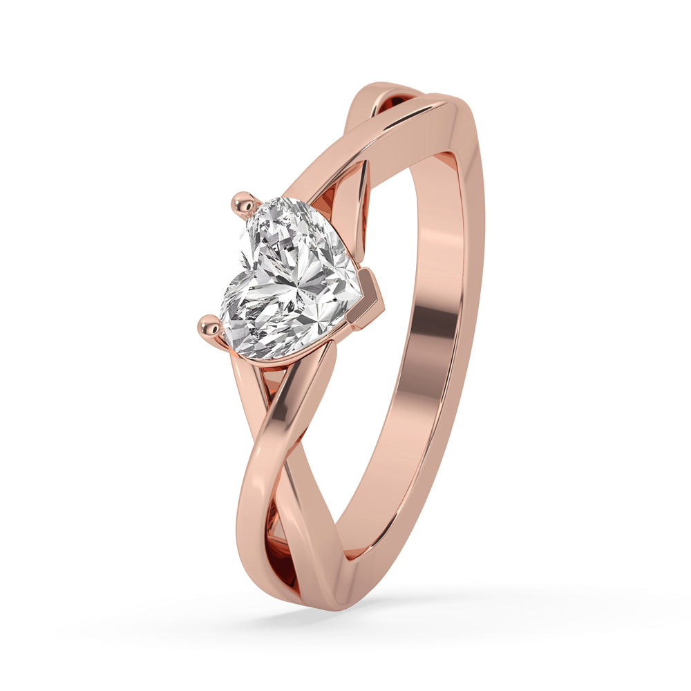 Antique engagement ring with heart shape diamond and twist ring.
