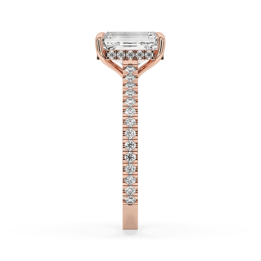 Timeless emerald cut diamond band with pave setting, featuring a hidden halo engagement ring and a carat diamonds engagement ring.
