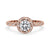 Close-up of a round diamond engagement ring with a sparkling centre stone set in a sleek metal band.