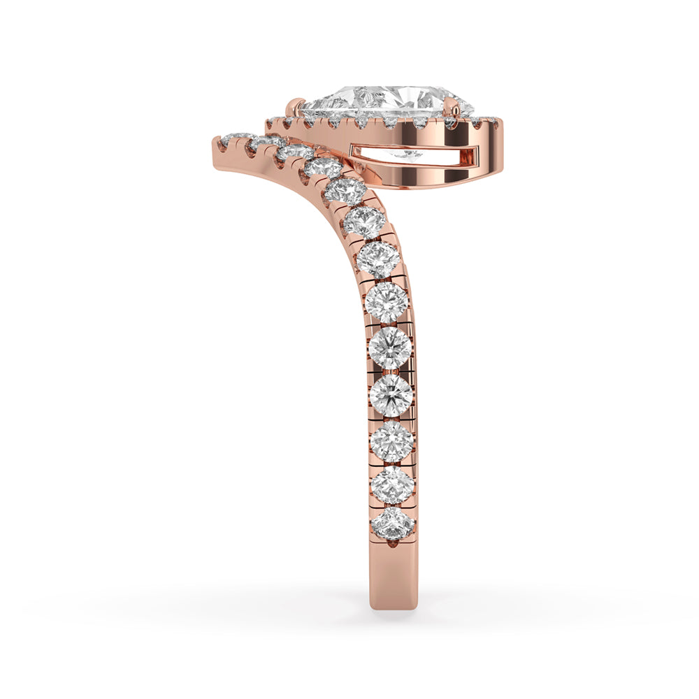 Pear shaped diamond ring with halo, crafted with IGI certified Lab Grown Diamond for an ethical choice.