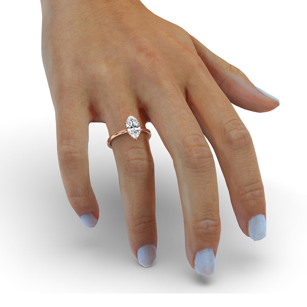 Marquise cut diamond ring with gold solitaire engagement ring design, featuring a 1 carat diamond, handmade ring
