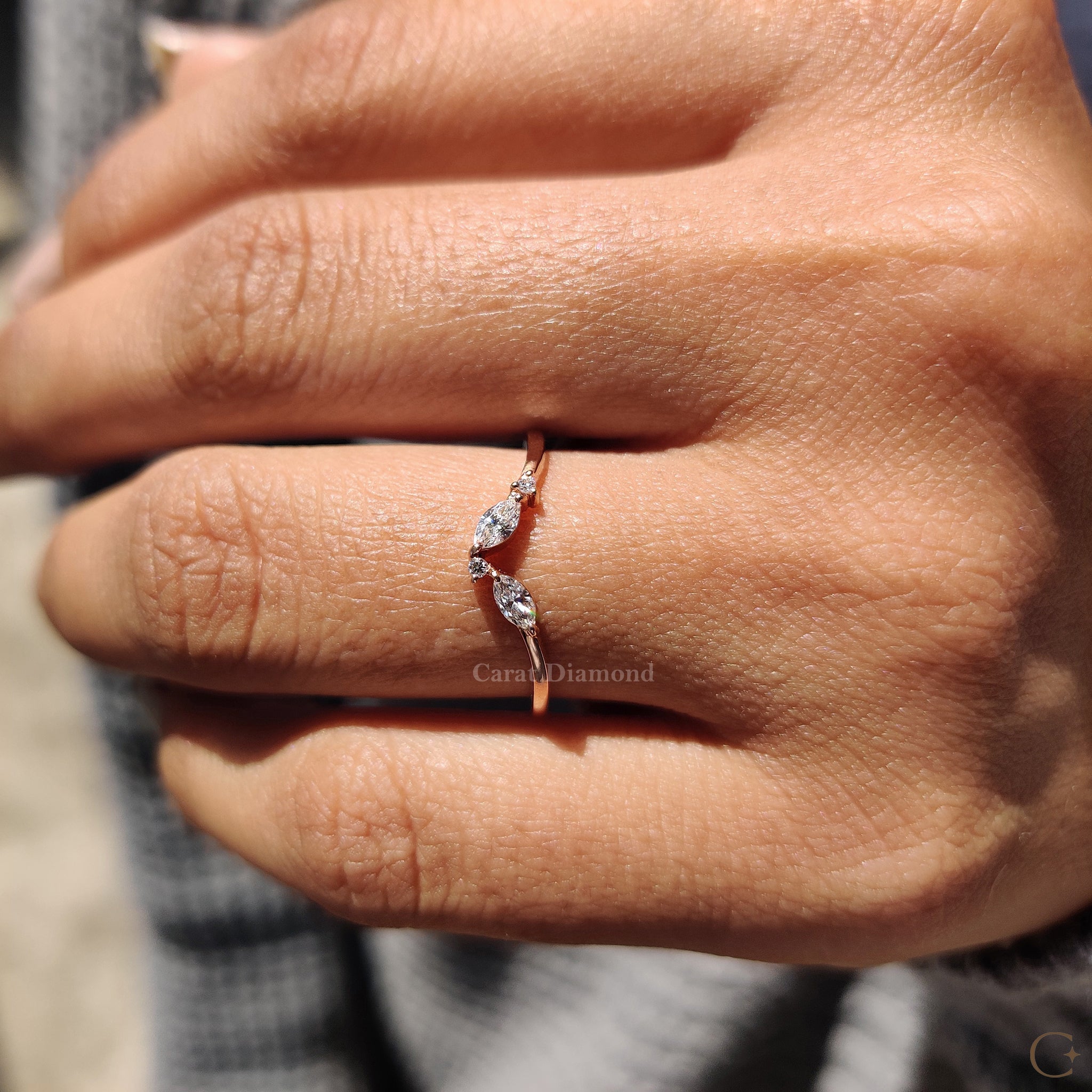 Custom wedding band featured beside sketch and tools.
