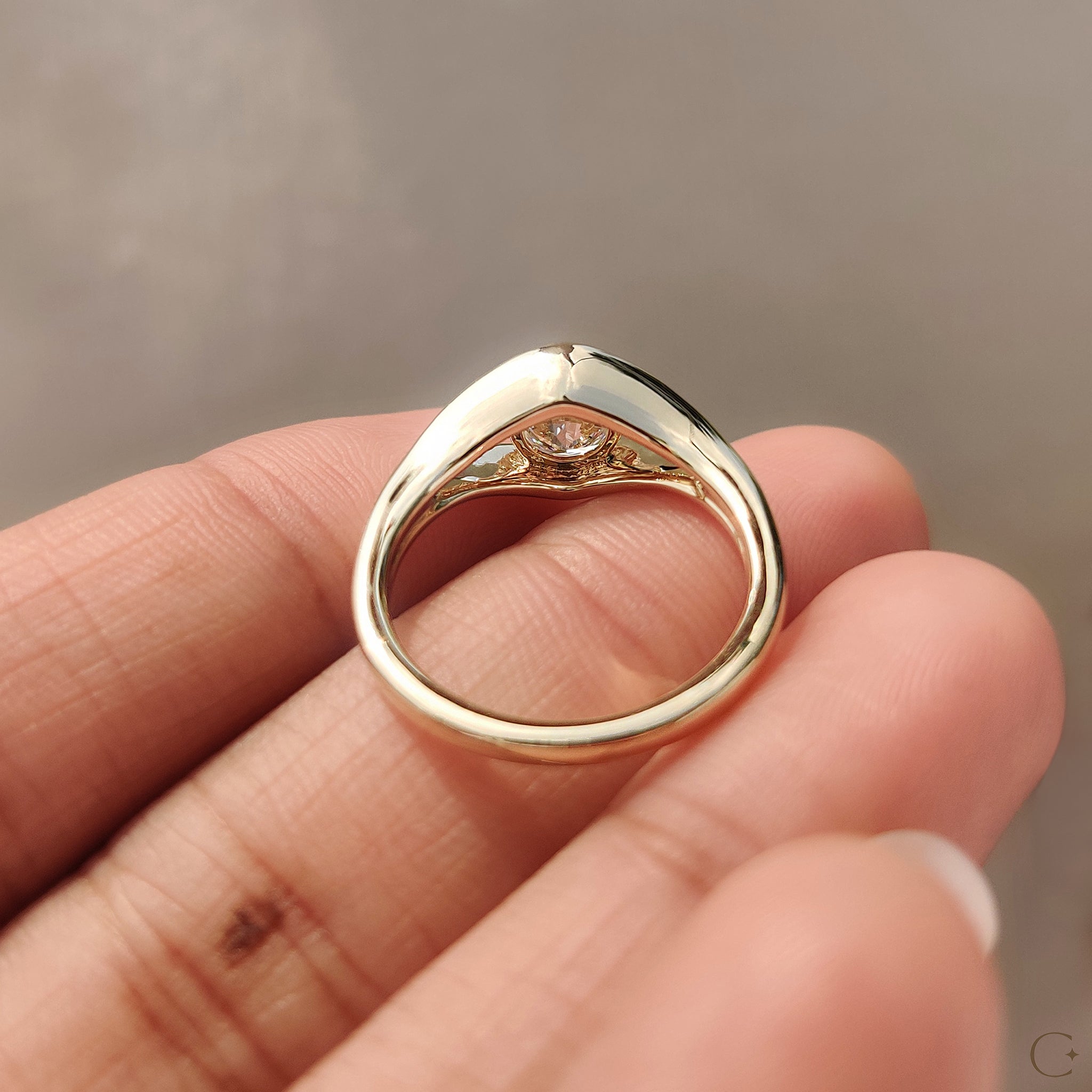 Handmade jewelry featuring a round cut diamond
