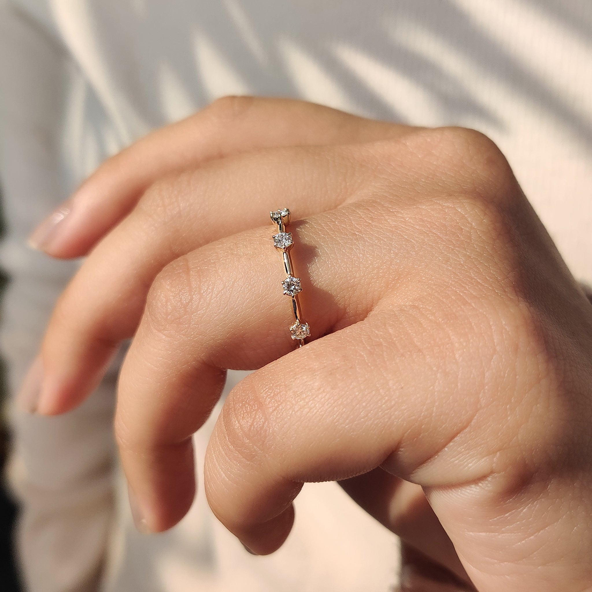 Claw Prong Setting on a diamond wedding band.
