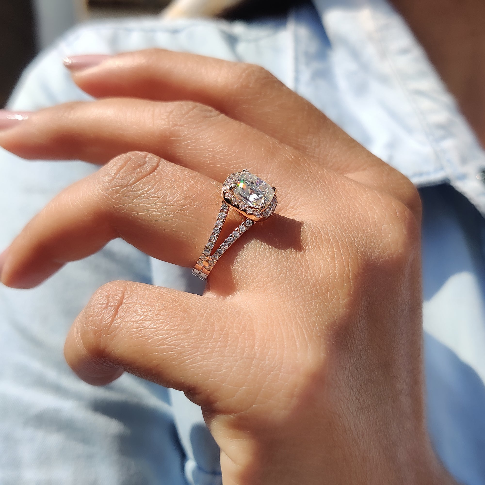 Cushion cut ring with a 4 claw prong setting in rose gold—an eye-catching and unique engagement ring option.

