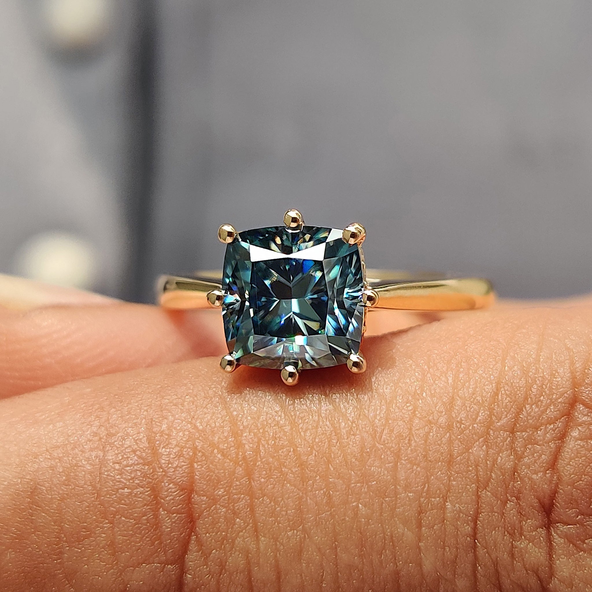 Moissanite engagement ring captures forever in every bright line.