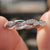 Pave twist wedding band with a unique, twisted design.