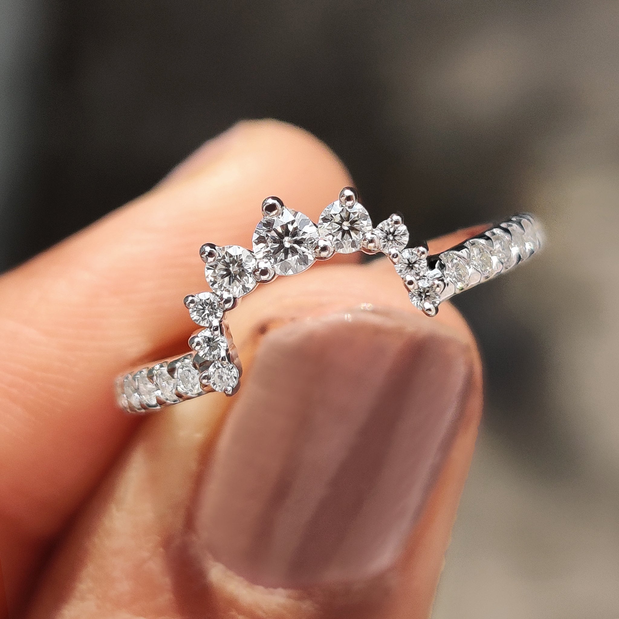 Stackable wedding band with round cut design, perfect for pairing with other rings.
