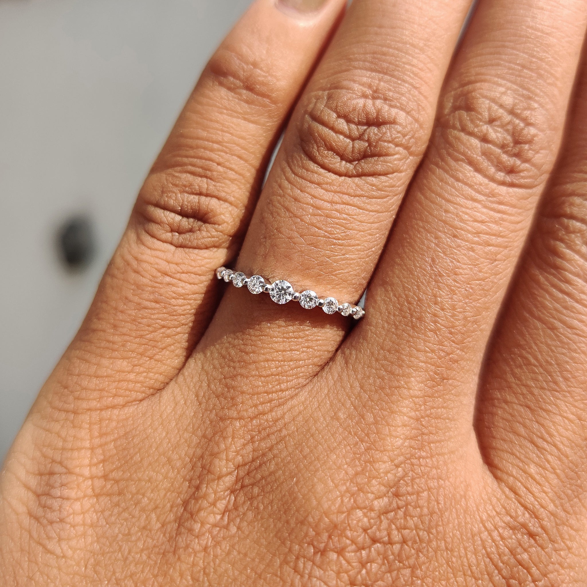 Carat Diamonds handmade wedding band in white gold.