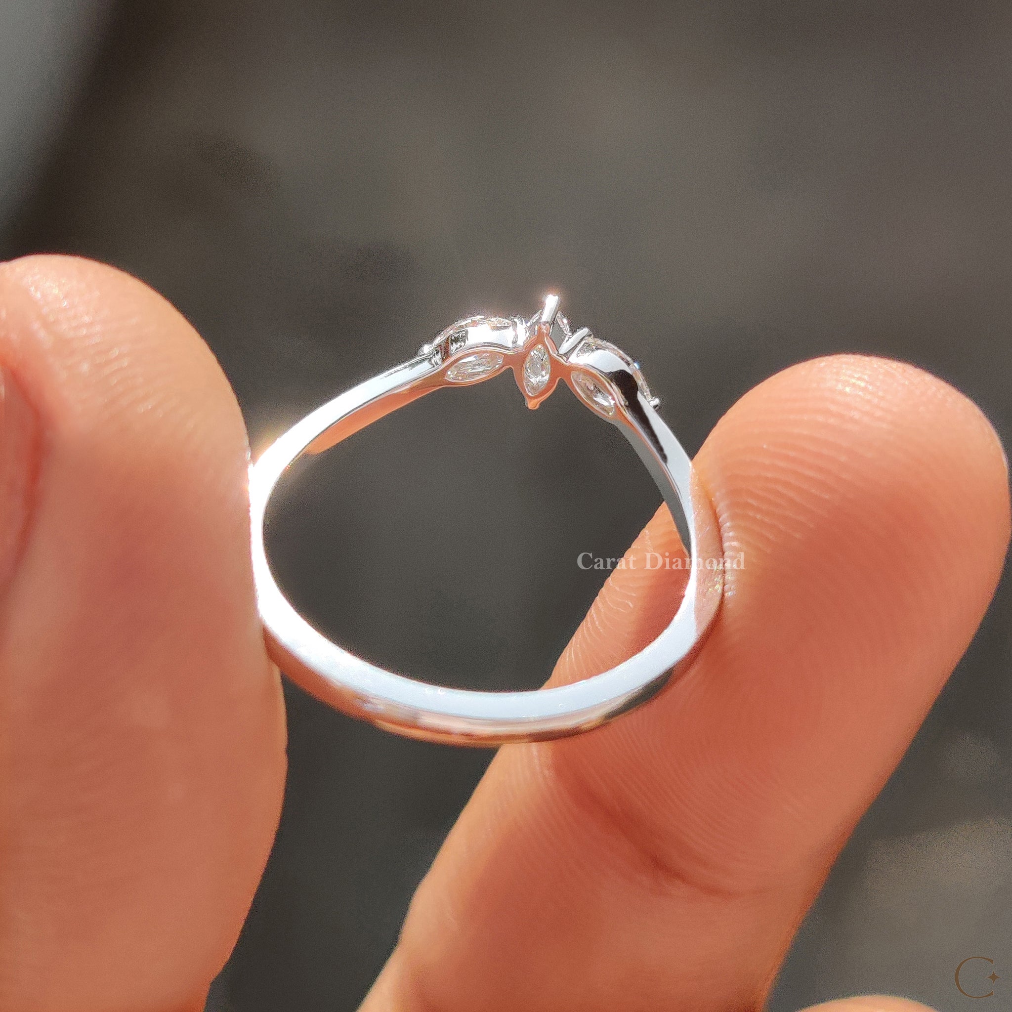 Lab grown diamond band with a curved shape for a unique bridal look.
