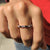 Round wedding band shaped for everyday wear.