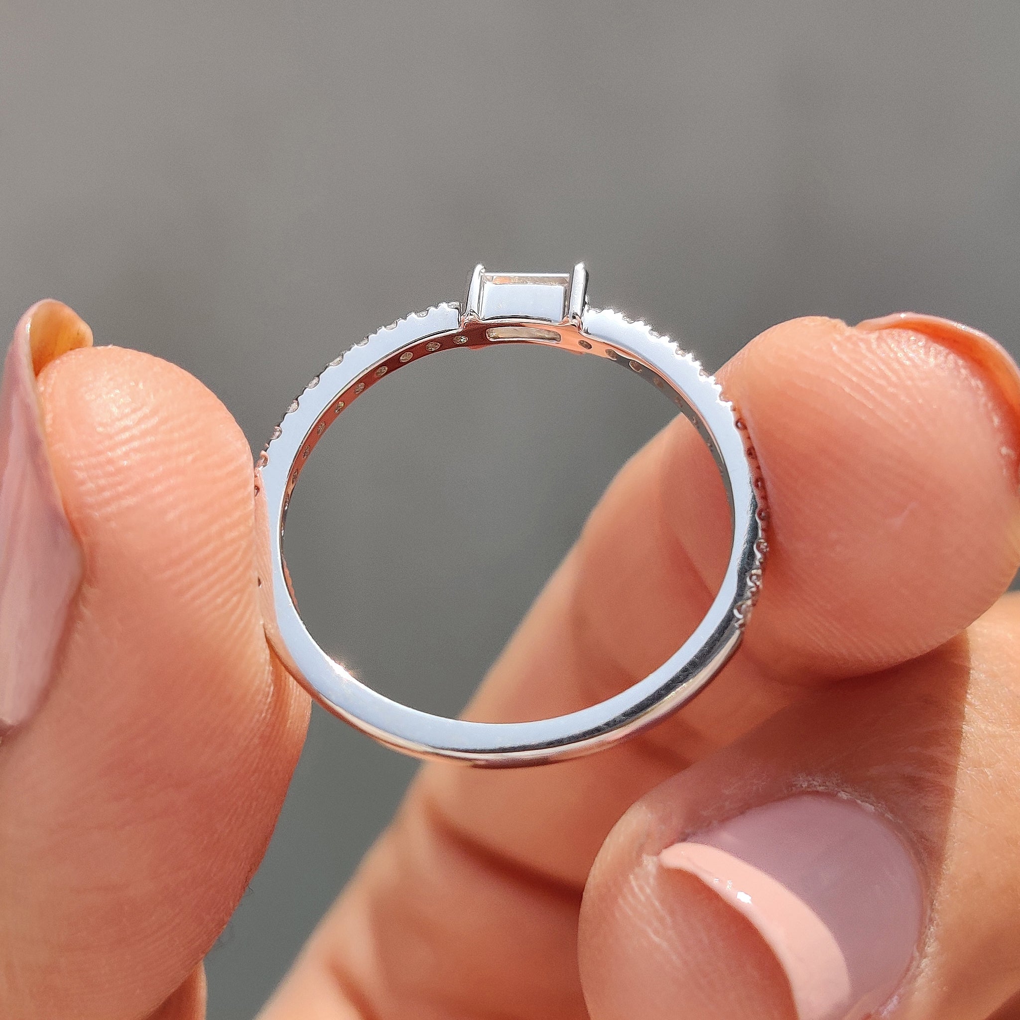 Prong set wedding band featuring stunning diamonds.
