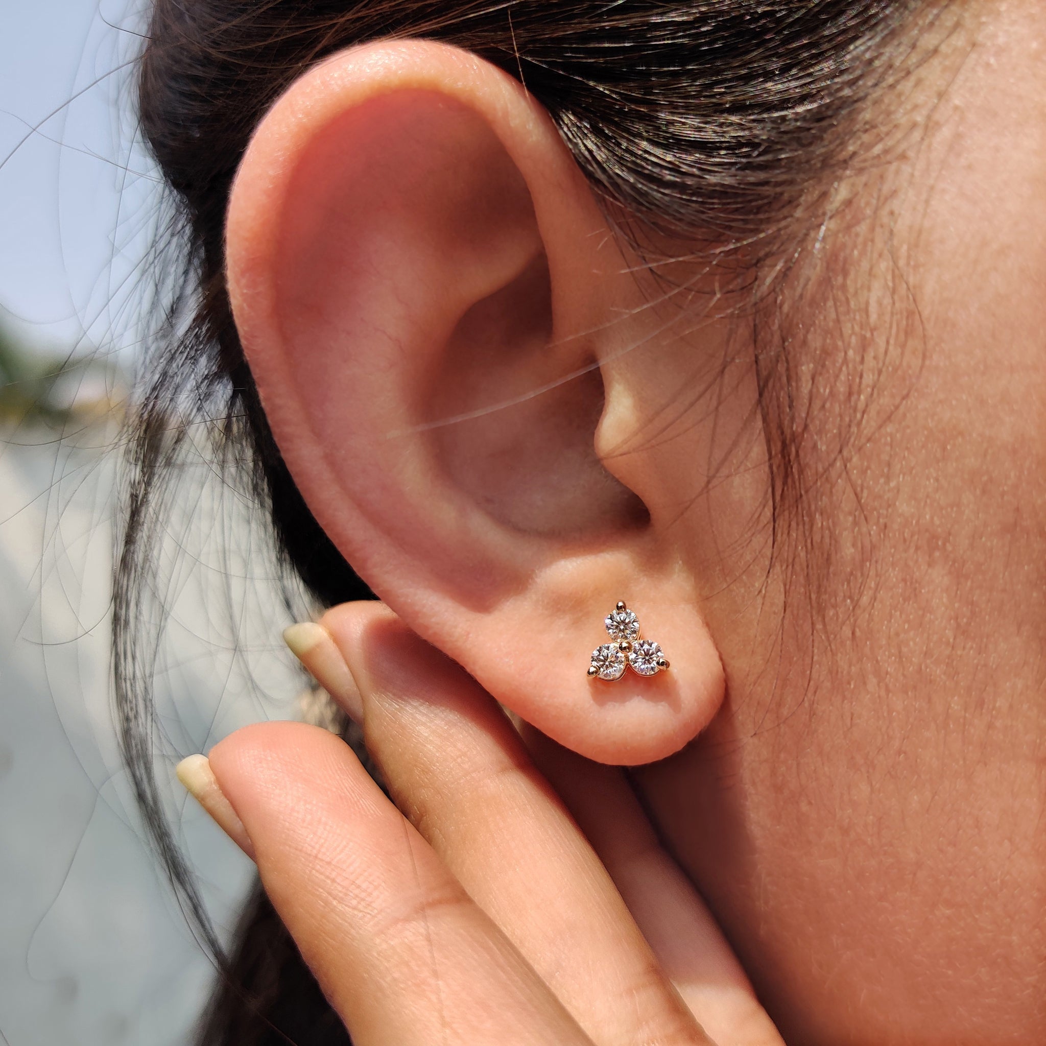 Round cut earrings made as three stone earrings with prong settings earrings and handmade detail.
