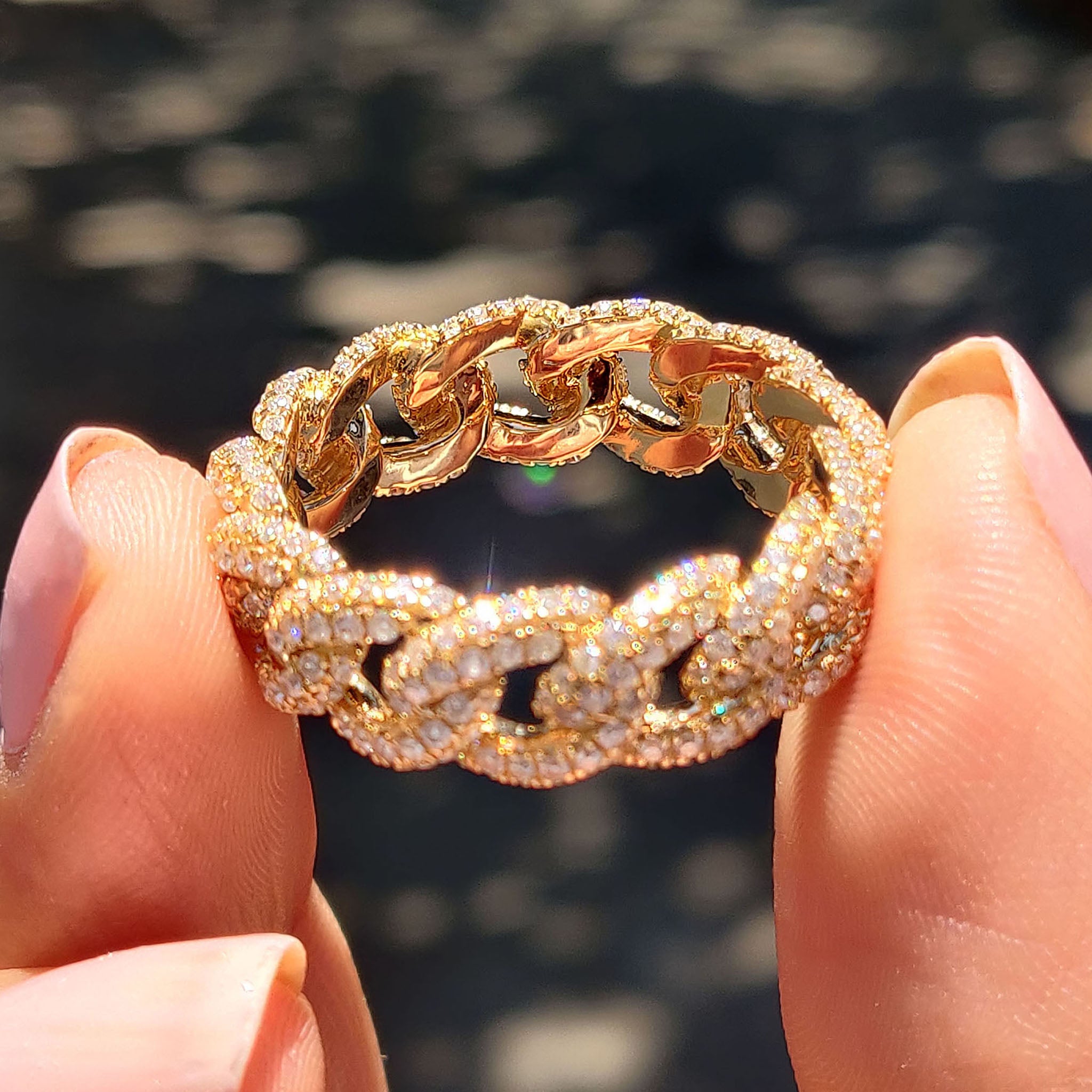 Custom wedding band with carat diamonds and moissanite stones, available in yellow gold.