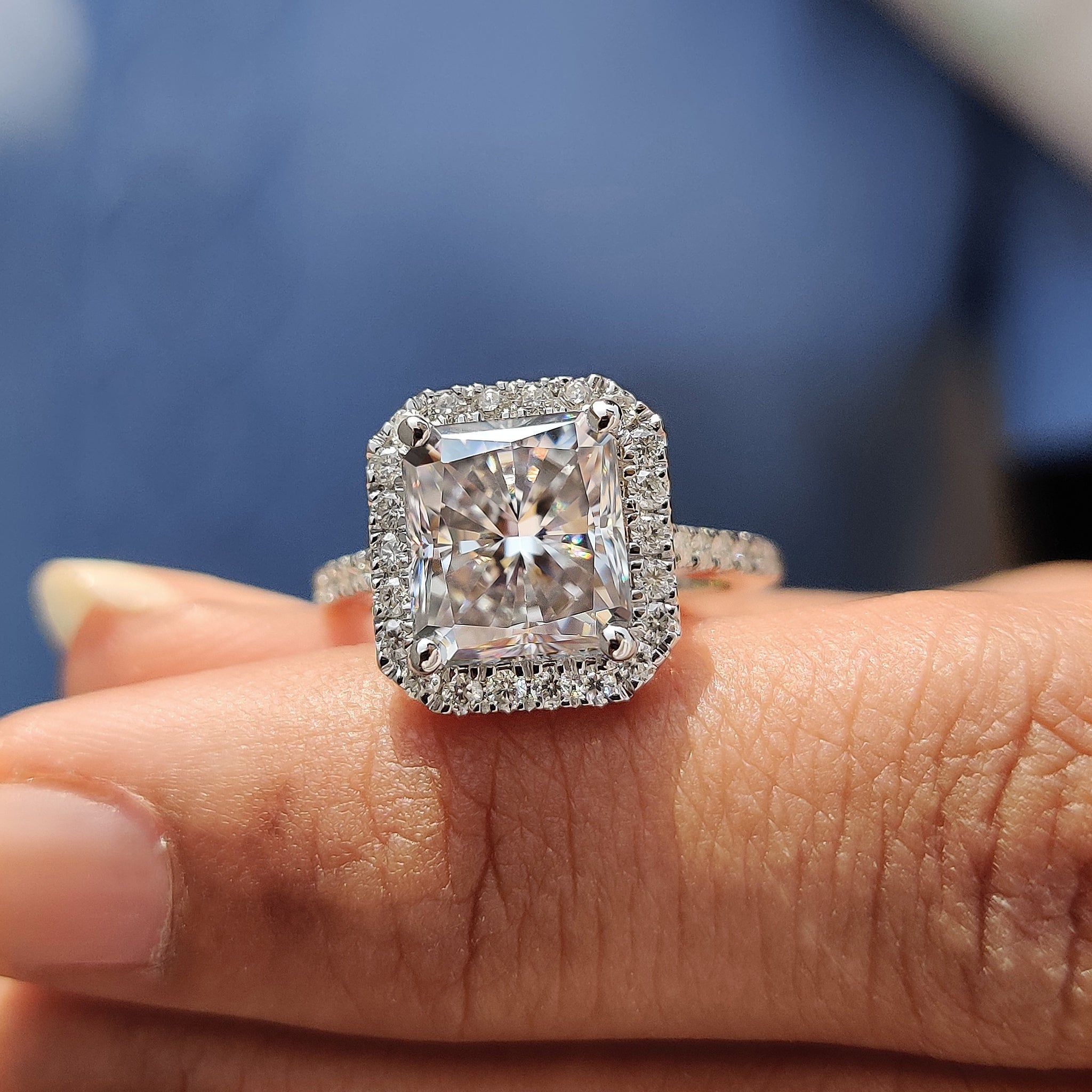 White gold engagement ring beams with polished sweet shine.