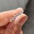 Shared Prong Diamond Band With Round Cut