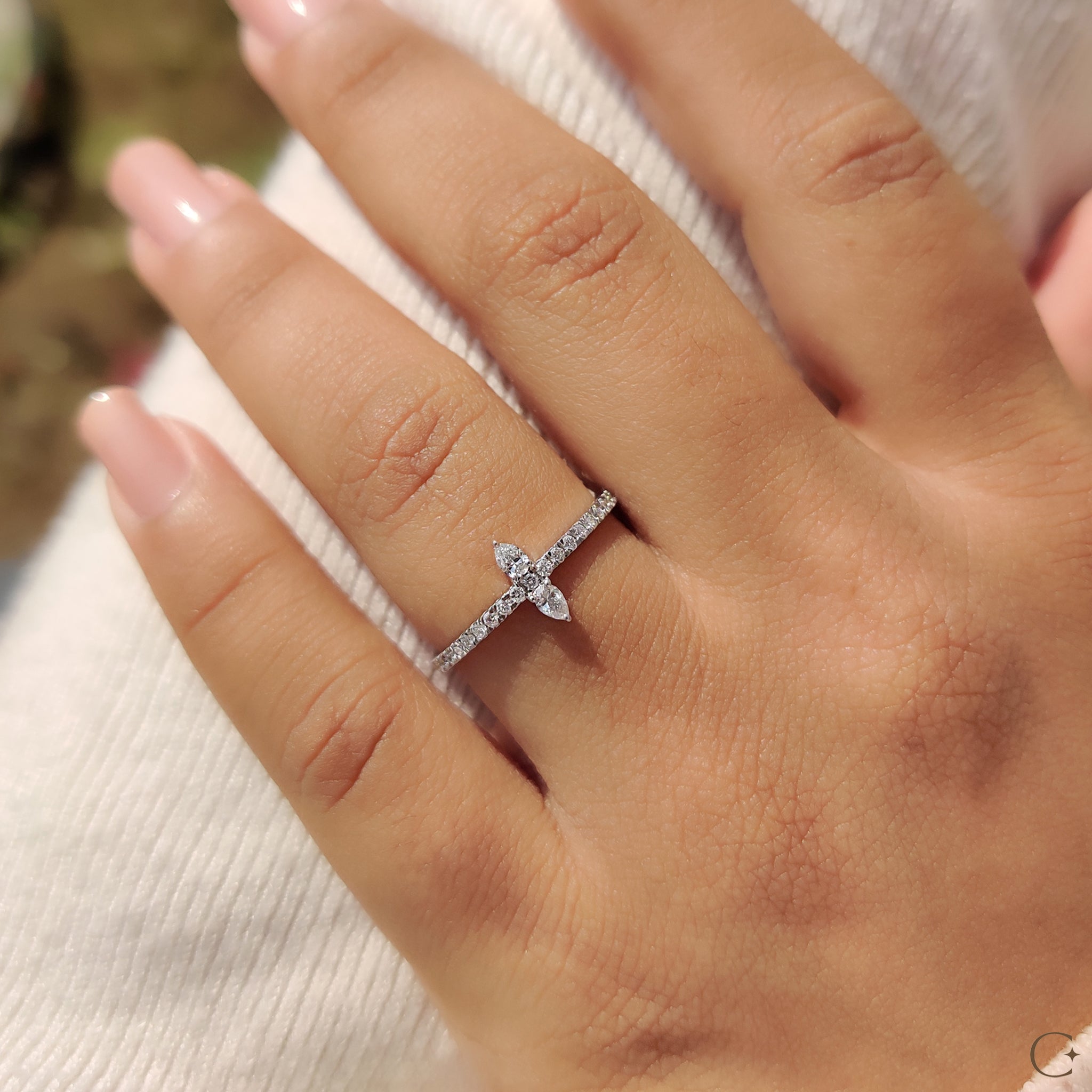 IGI certified round cut pave engagement ring from Carat Diamonds.
