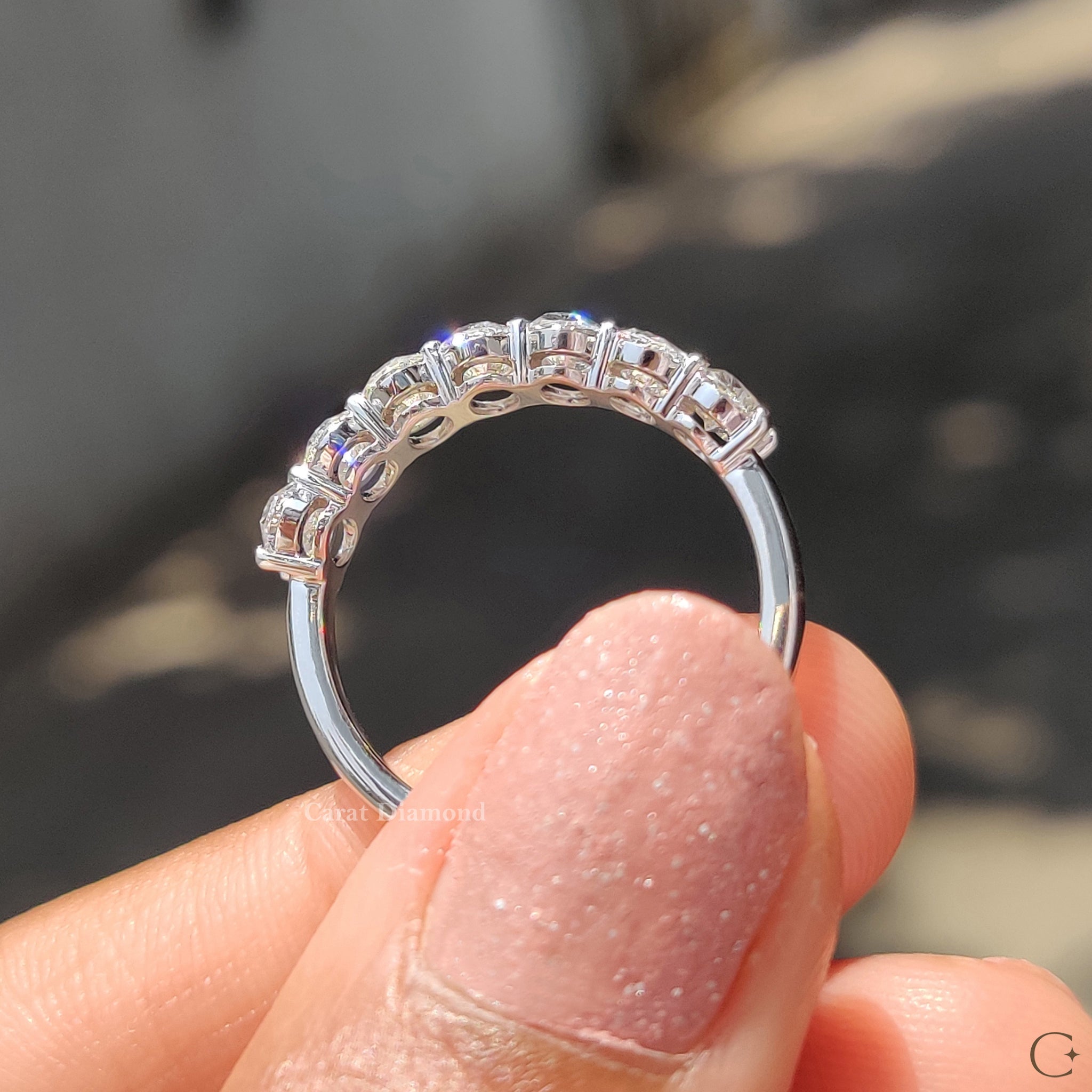 Carat Diamonds wedding band in white gold.
