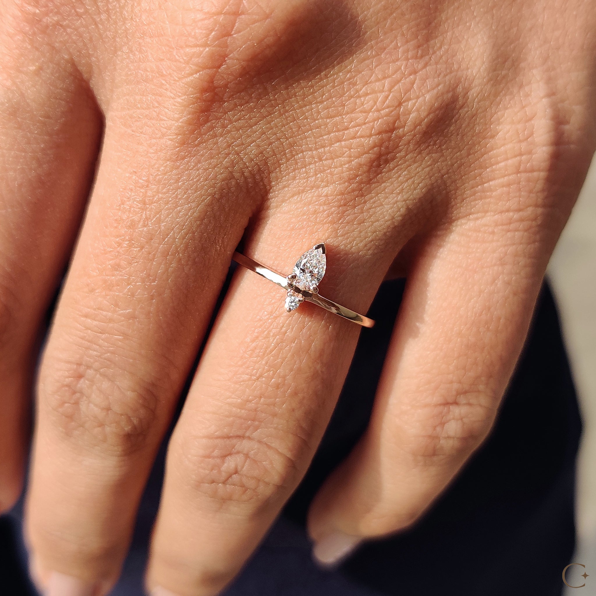 Lab grown diamond ring in a unique two-stone design.
