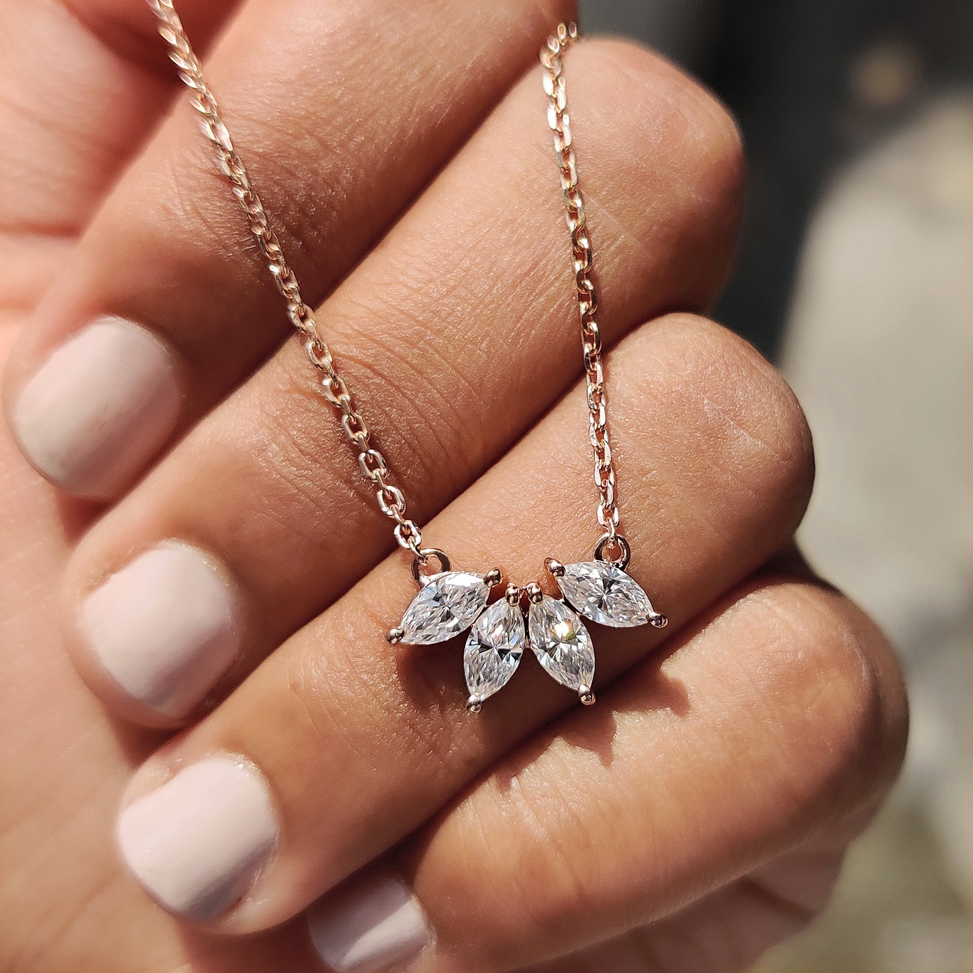 Rose gold pendant available in Arc Marquise Moissanite Pendant and custom wedding pendant.
