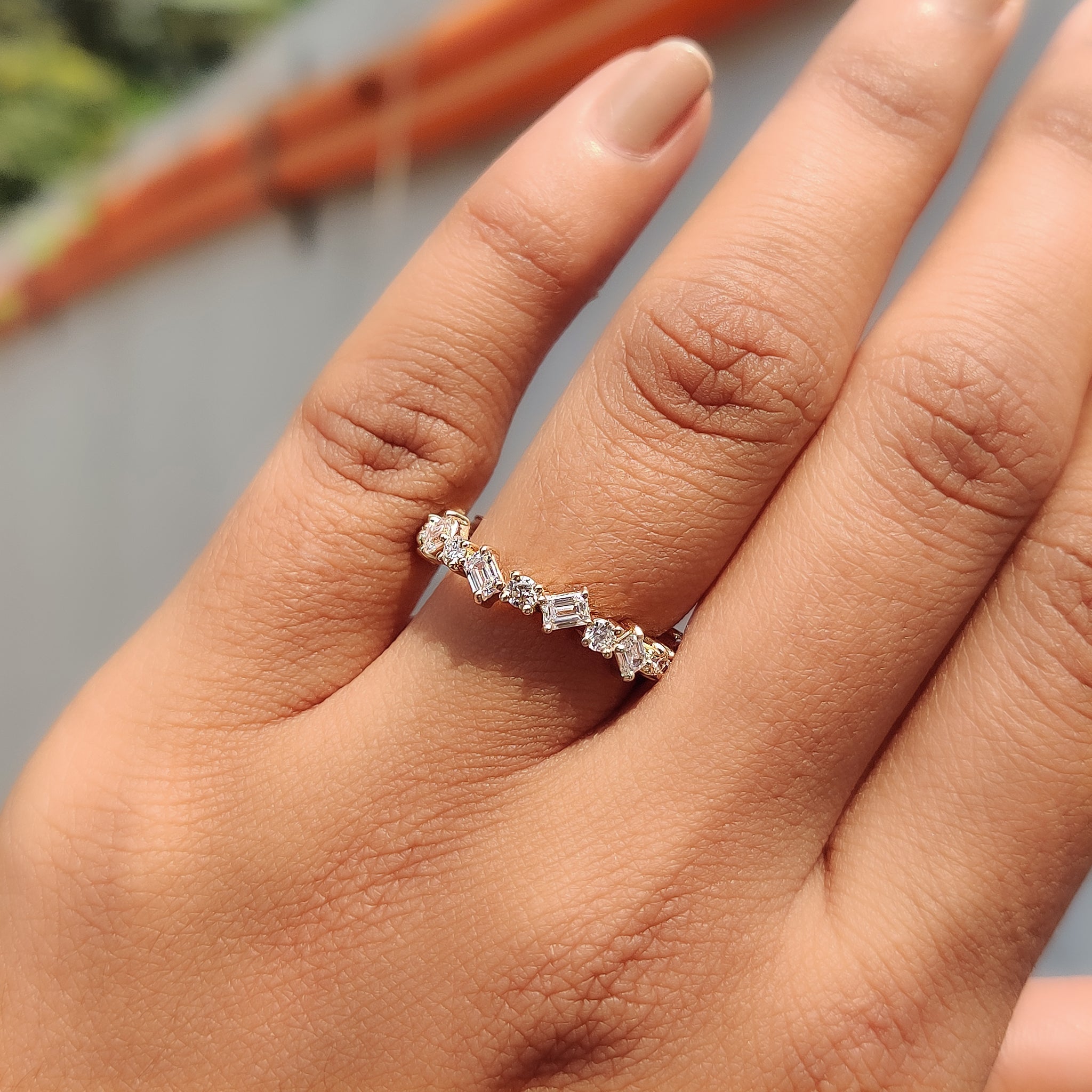 Prong set wedding band showcasing lab grown diamonds.