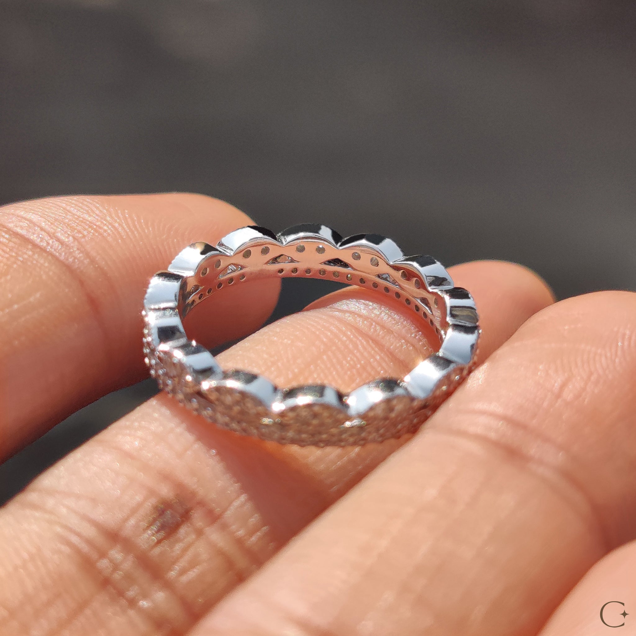 White gold eternity band with a timeless finish.
