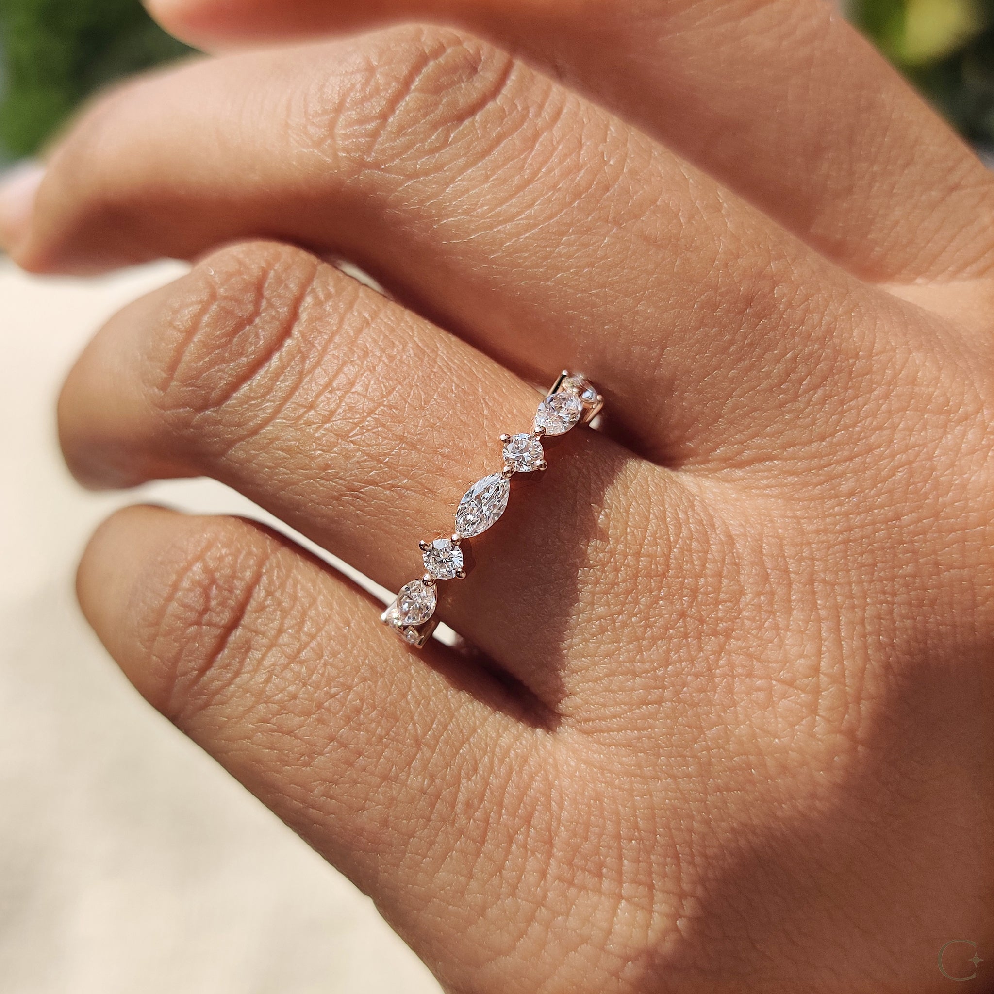 Classic round and marquise design for a wedding band.
