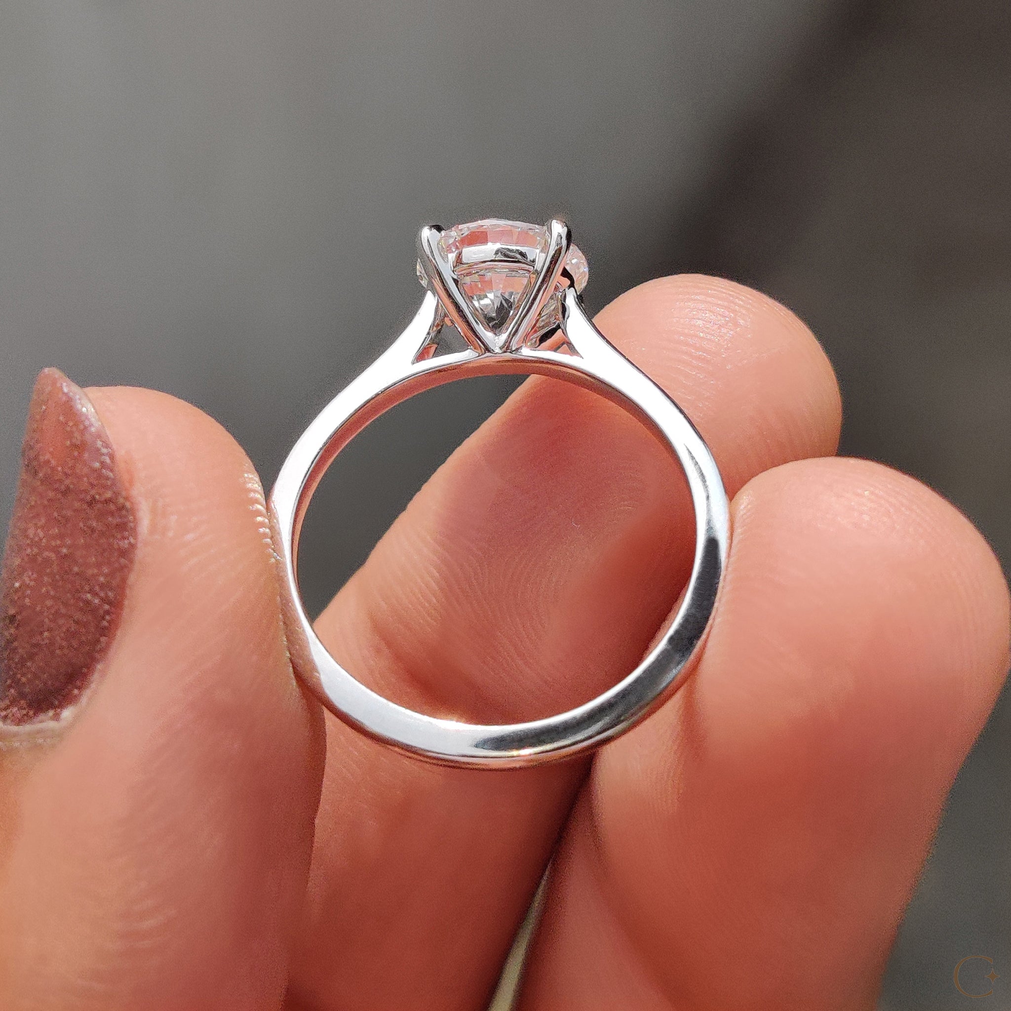 Carat diamonds engagement ring with a classic solitaire setting.

