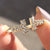 Round moissanite wedding band with brilliant sparkle.