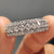 Multi row anniversary band featuring round moissanite in three layers.
