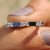 Moissanite wedding band built to sparkle.