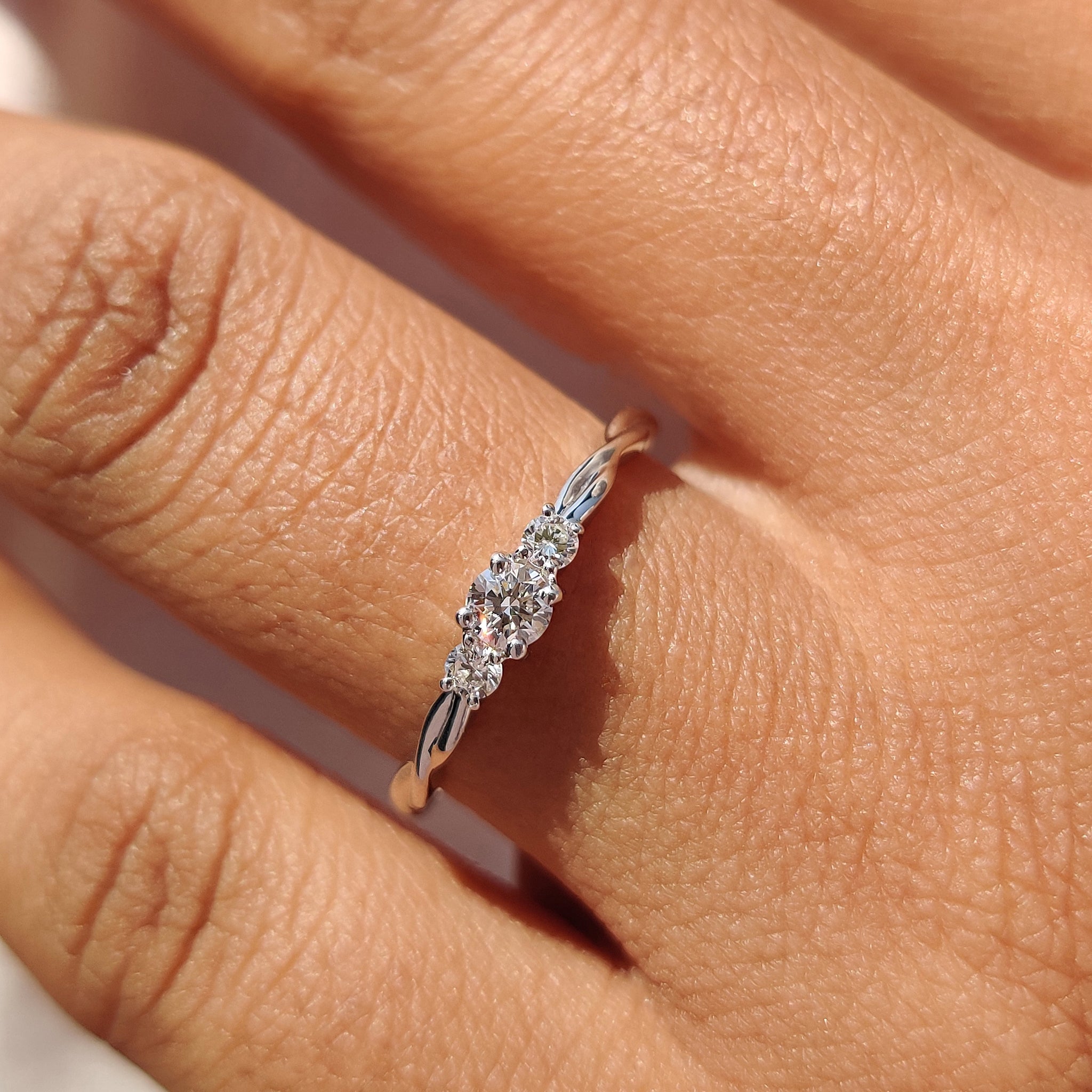 Round cut diamond ring set in a classic solitaire design.
